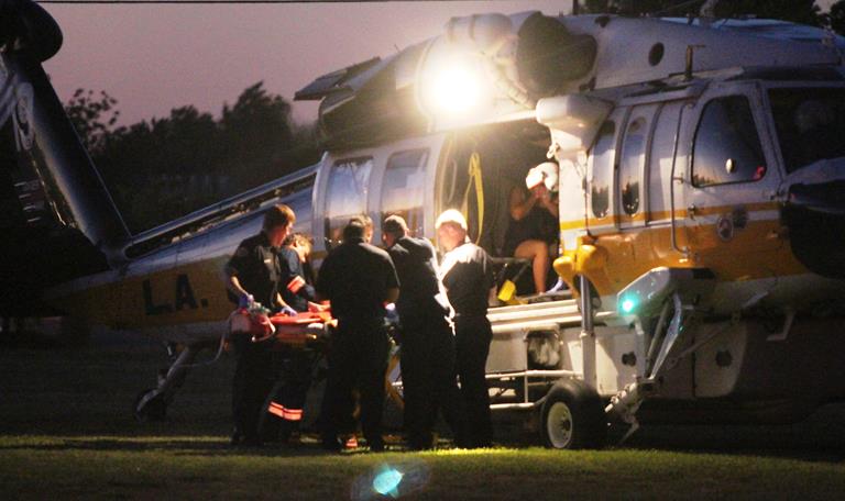 A 2-year-old and his pregnant mother were airlifted to Antelope Valley Hospital Friday night, after the toddler fell into the family pool. (Photos by TONY CHEVAL)