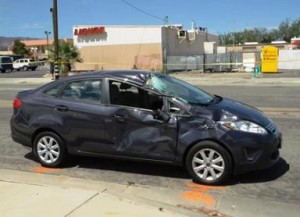 The Ford's 84-year-old driver stopped at the stop sign before crossing the intersection, authorities said. (Photo by LUIS MEZA)