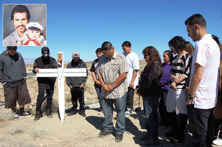 Family and friends of 49-year-old Arturo De La Torre (early photo top right)  gathered around a cross Monday morning at the site where De La Torre was killed in a car crash on Sept. 21.