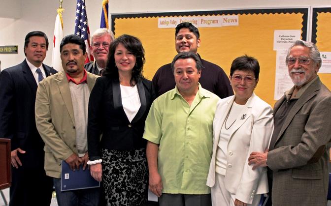 At a press conference Tuesday, Lancaster city officials announced a partnership with Cal State University of Long Beach and the Coalition for Human Immigrant Rights of Los Angeles to offer Spanish language G.E.D. courses at the Lancaster University Center. (L to R, Front: Antonio Bernabe, CHIRLA; Council member Sandra Johnson; Omar Ruiz, CHIRLA; Lilia Galindo; Ed Galindo, Tapestry Commission member. L to R, Back: Kelvin Tainatongo, City of Lancaster; Ken Santarelli, CSULB-AV; Luis Garibay, City of Lancaster.