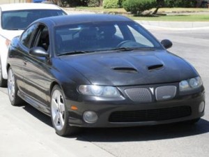 Hall is accused of snatching his girlfriend's 2-year-old son on June 8 and driving the toddler from Las Vegas to Lancaster in this stolen Pontiac GTO. (LASD)