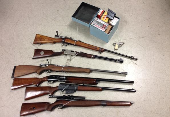 Authorities said these weapons were found Wednesday at the Lancaster home of an AB 109 offender who was targeted for violating his post-release conditions. (Photo courtesy LASD)