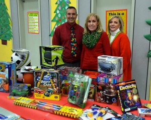 The boutique was the pet project of third grade teacher Jeff Pettipas (left), who led the campaign to collect new toys to be given away. (Contributed)