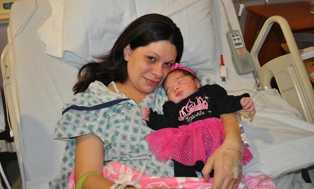 Mother Nicole Jackson proudly introduces her new daughter, Millissa. (Contributed photo)
