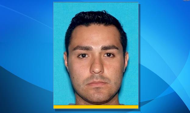 Henry Solis, 27, was terminated from the Los Angeles Police Department Tuesday, March 17. He is wanted for a homicide that occurred March 13 in the city of Pomona. His father is Lancaster resident Victor Solis, who admitted to helping driving his son to El Paso, Texas, soon after the killing, according to a federal arrest warrant issued Thursday. (Photo courtesy Pomona Police Department. View the wanted poster here.) 
