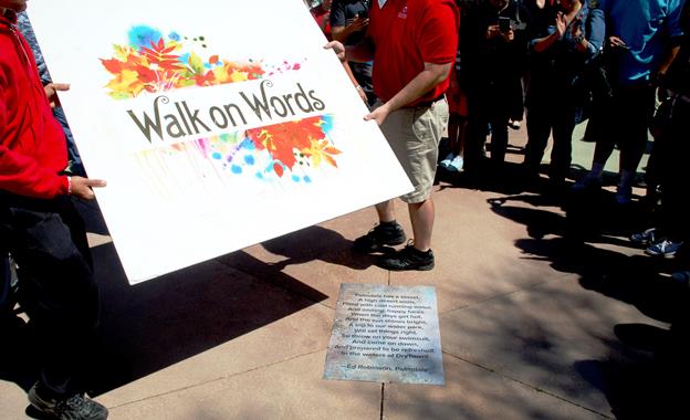 Organizers on Saturday, May 23, unveil the winning poem in the City of Palmdale's third annual Walk on Words poetry contest. (contributed)